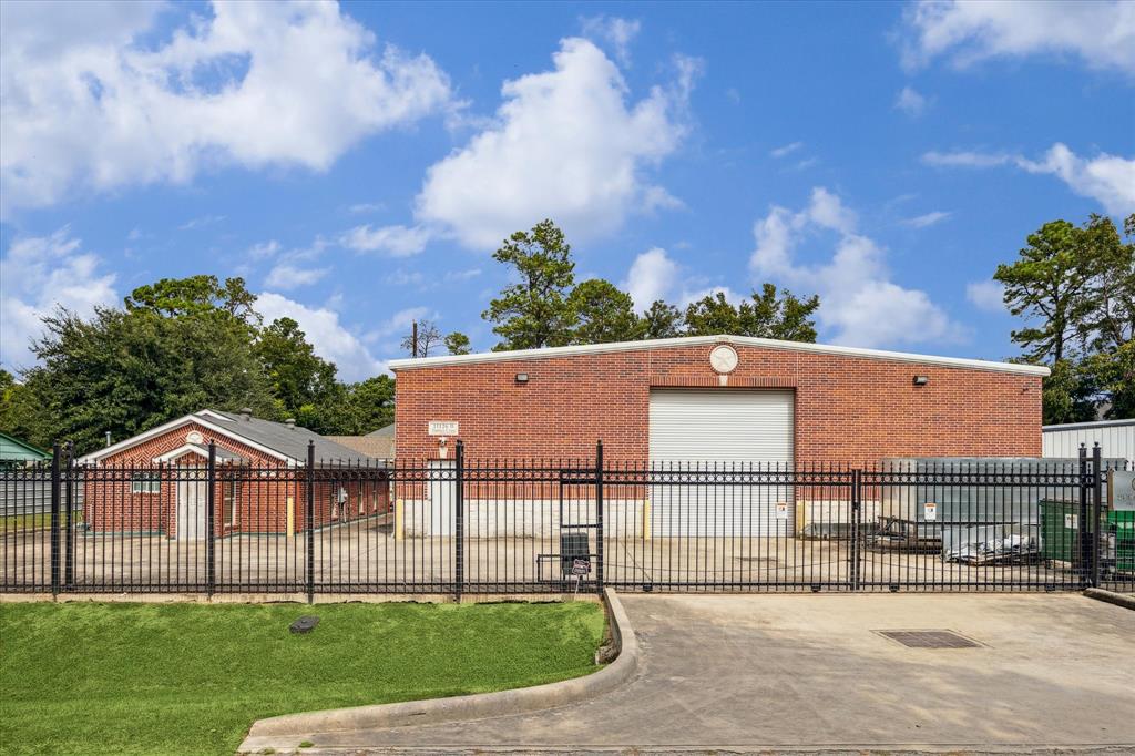 a view of house with yard