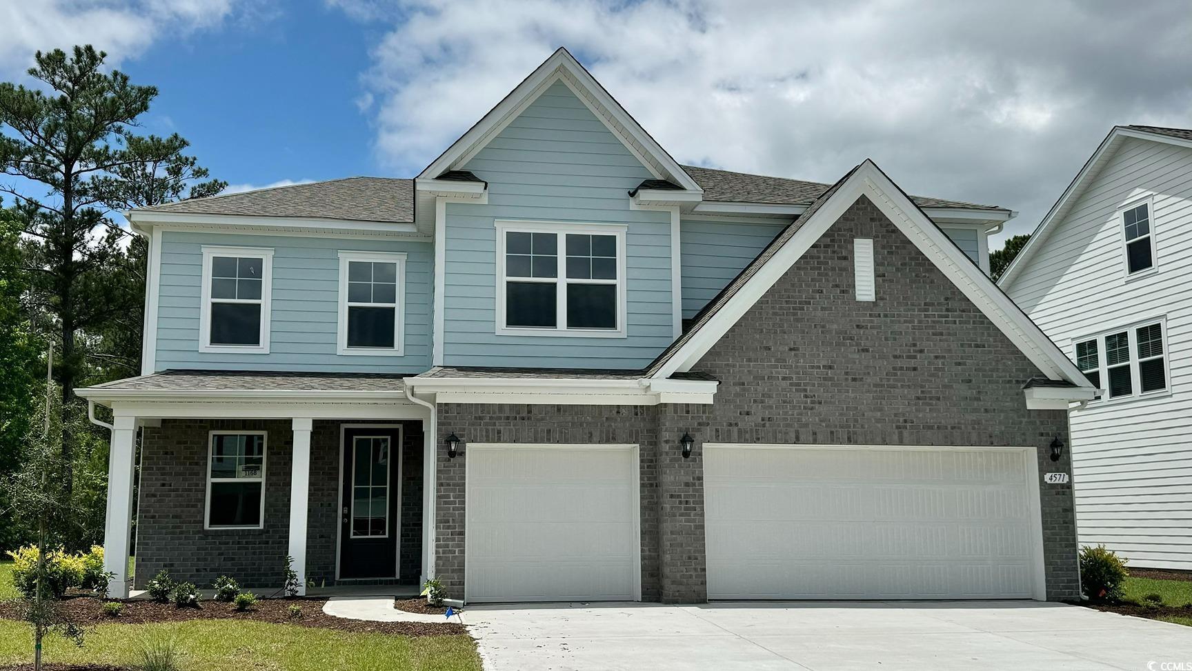 Craftsman inspired home with a garage