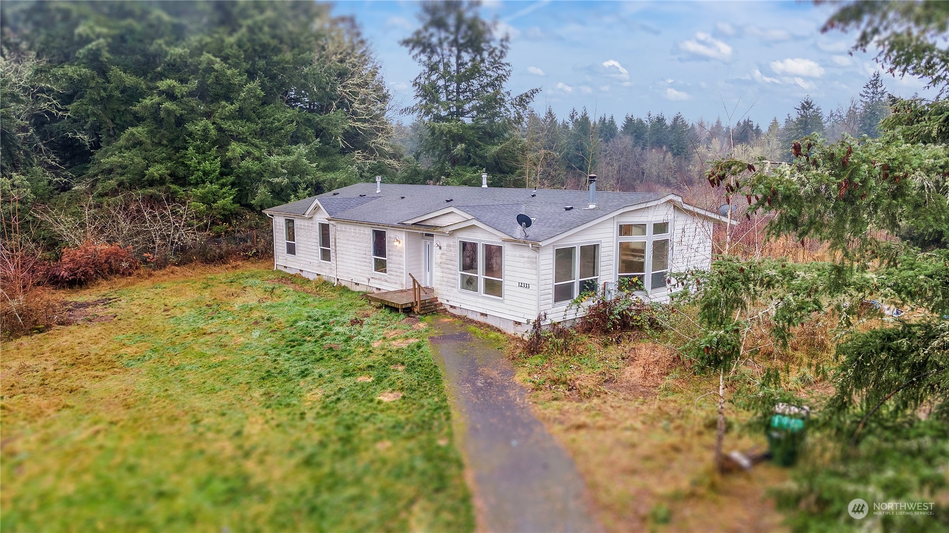 a aerial view of a house with a garden