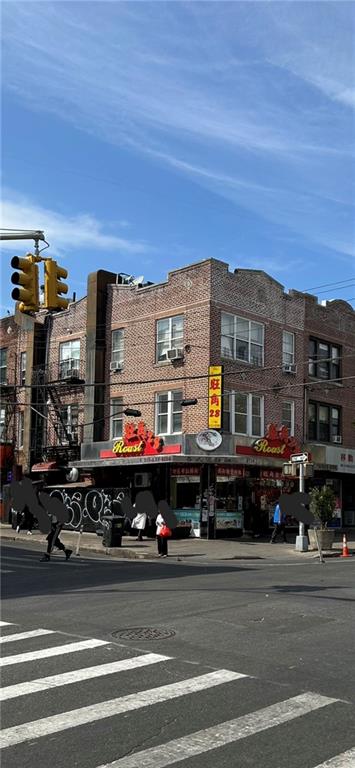 a view of a building and a street