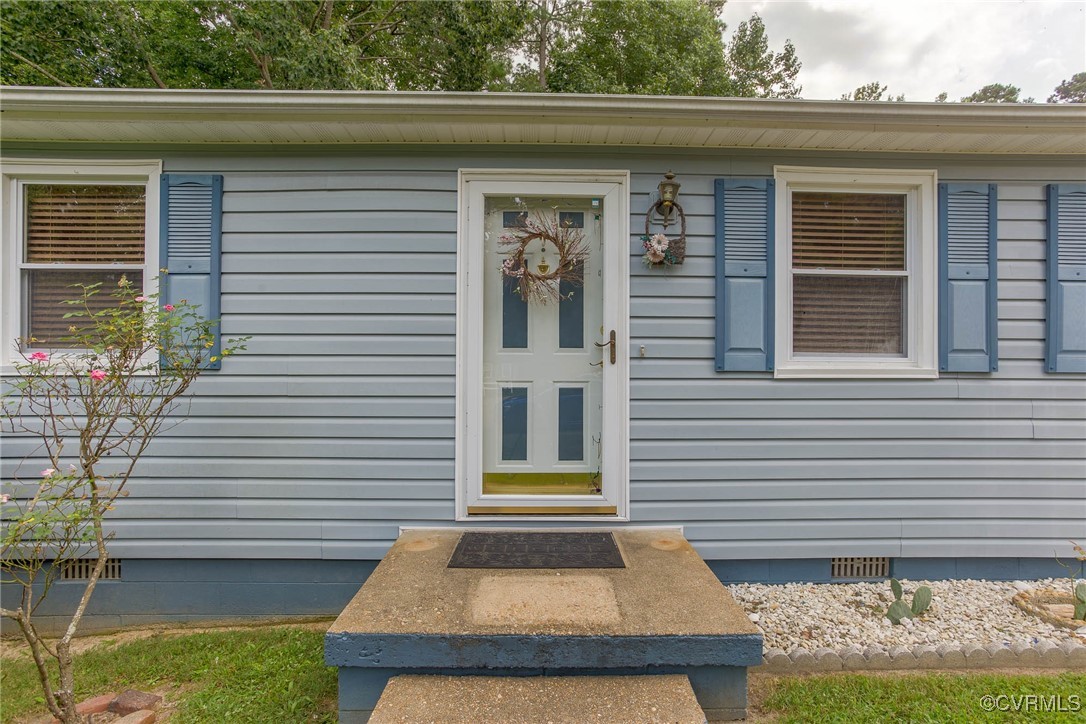 a front view of a house with garage