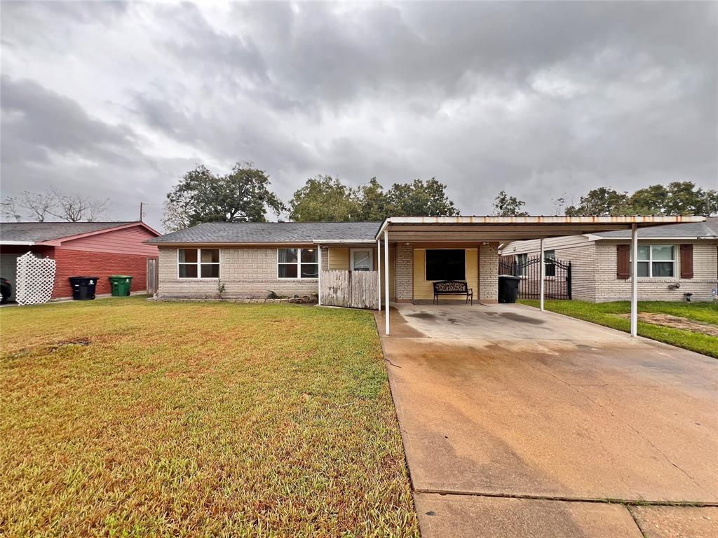 front view of a house with a patio