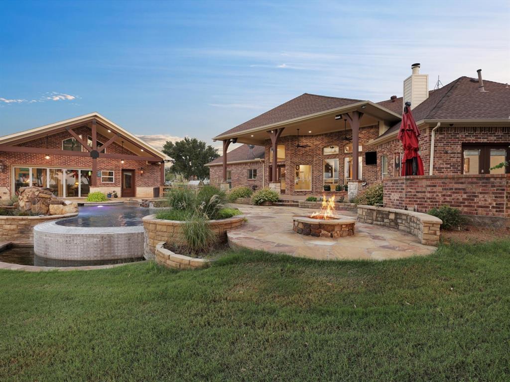 a view of house with outdoor space and yard