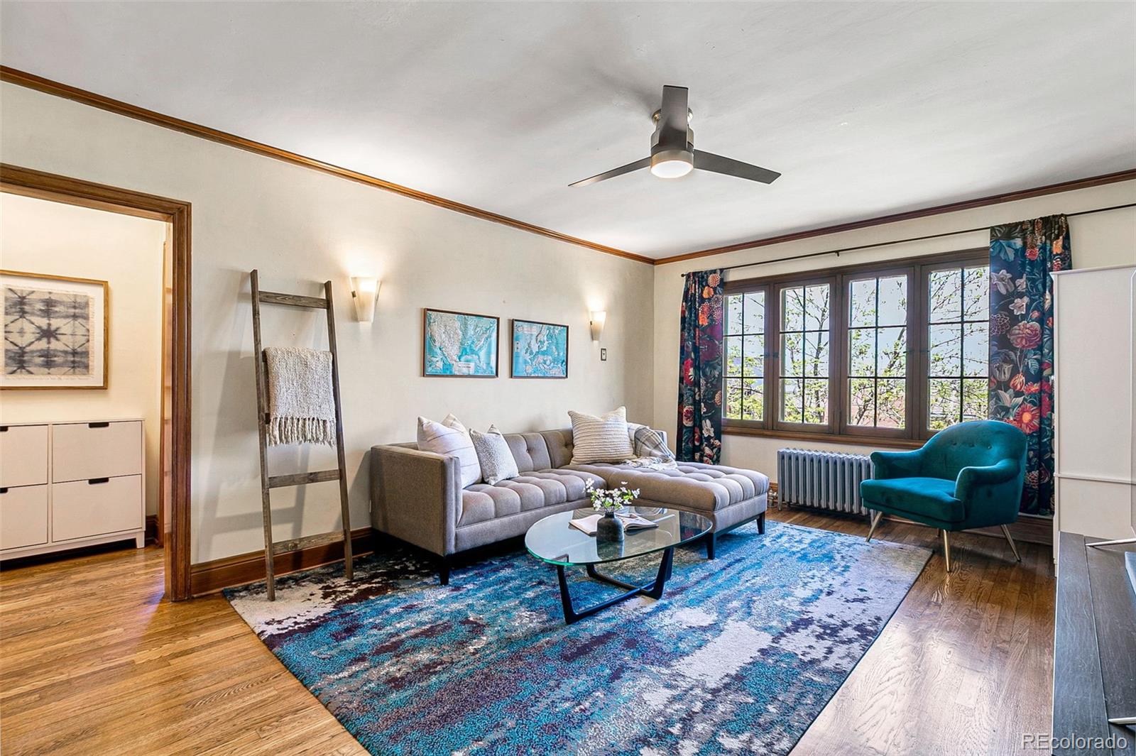 a living room with furniture and a window