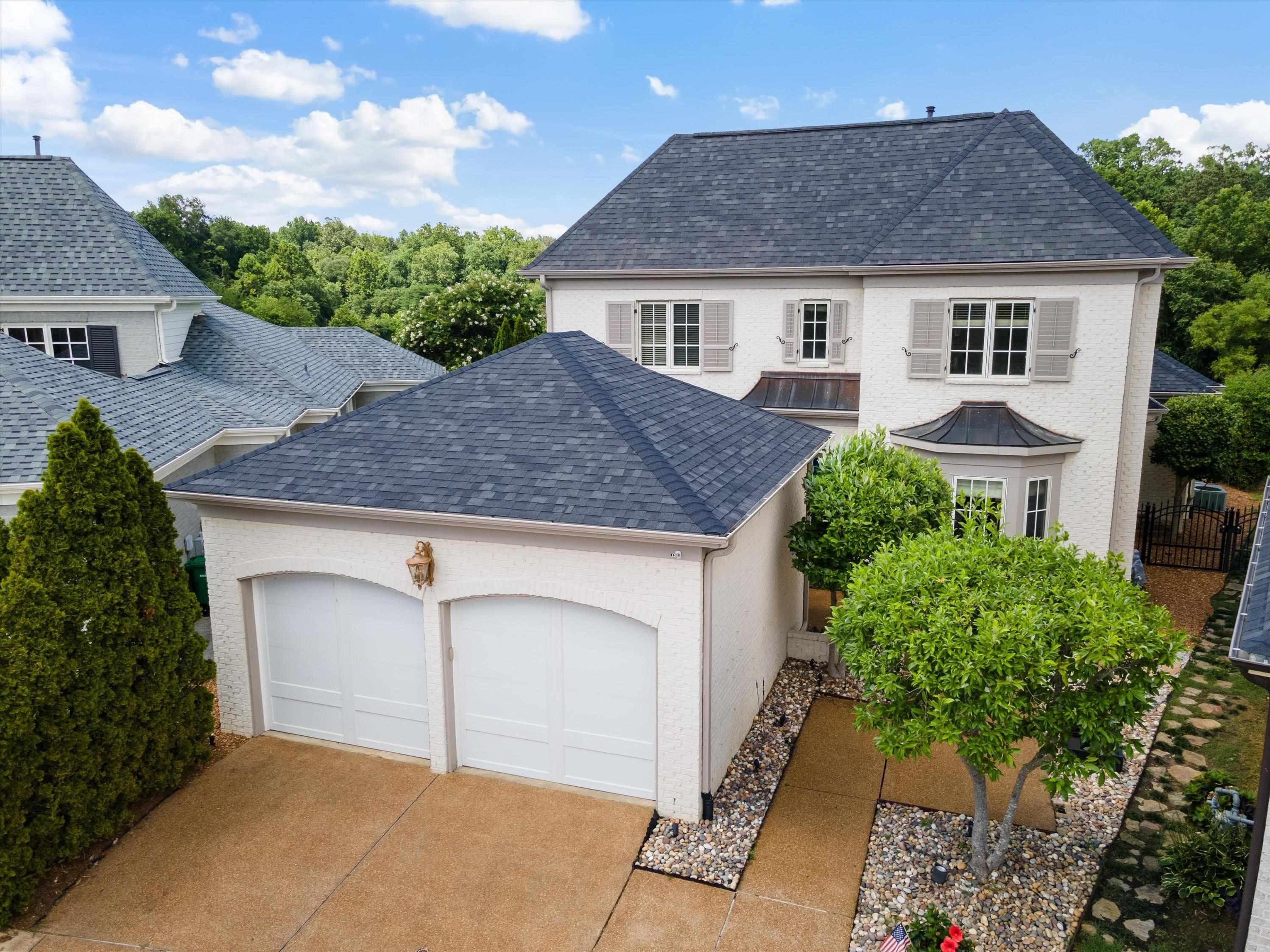 a house view with a garden space