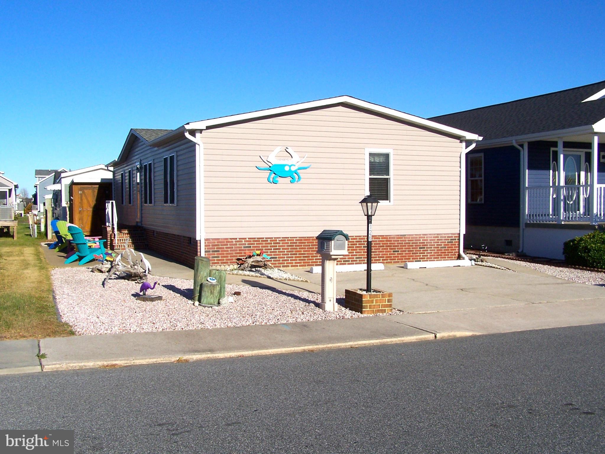 a view of a house with a street