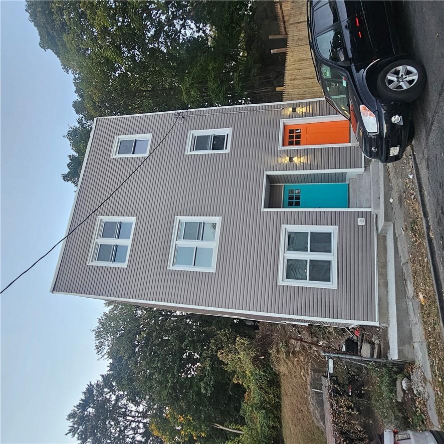 a car parked in front of a house