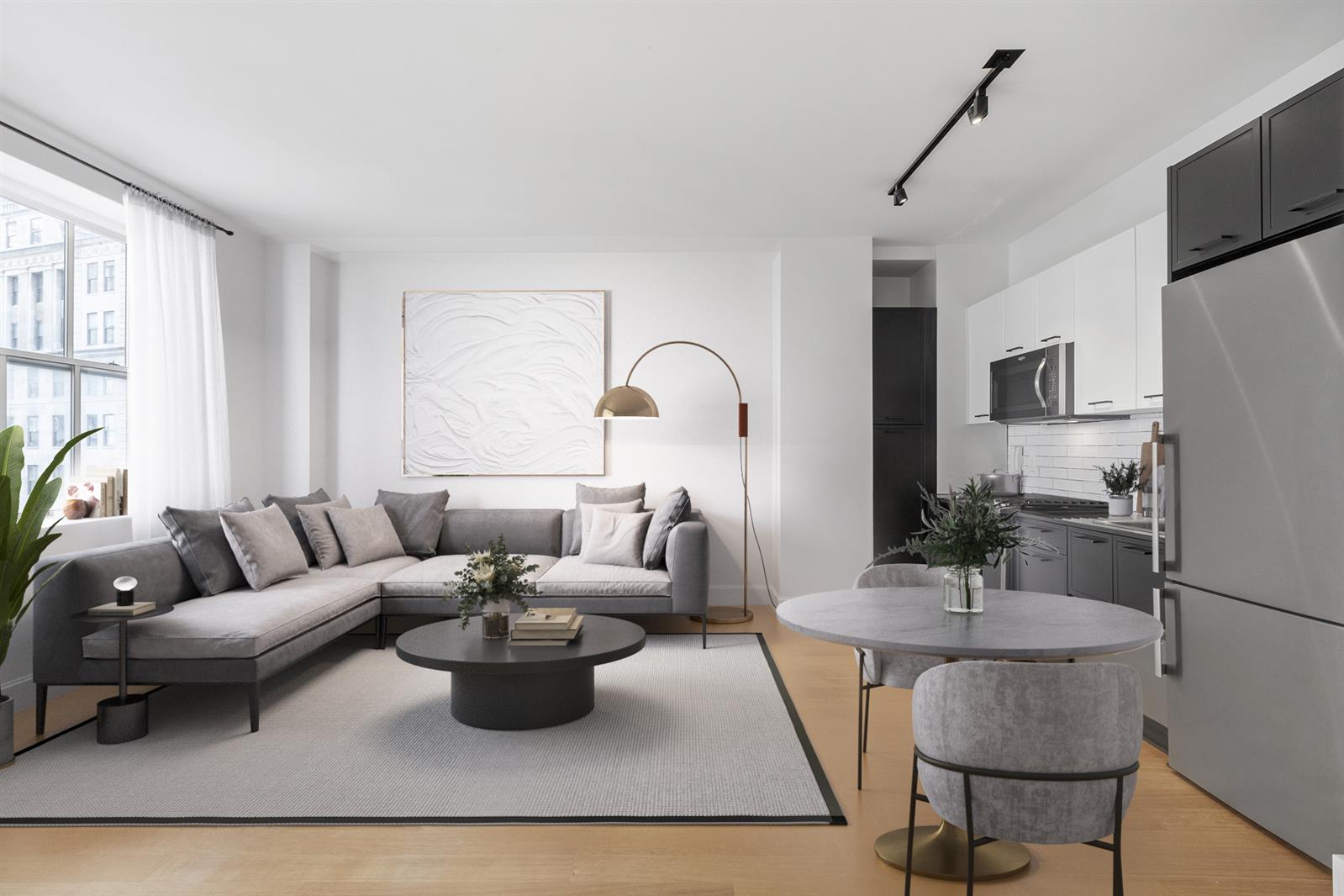 a living room with furniture potted plant and a window