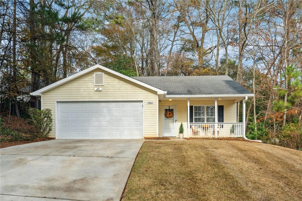 front view of a house with a yard