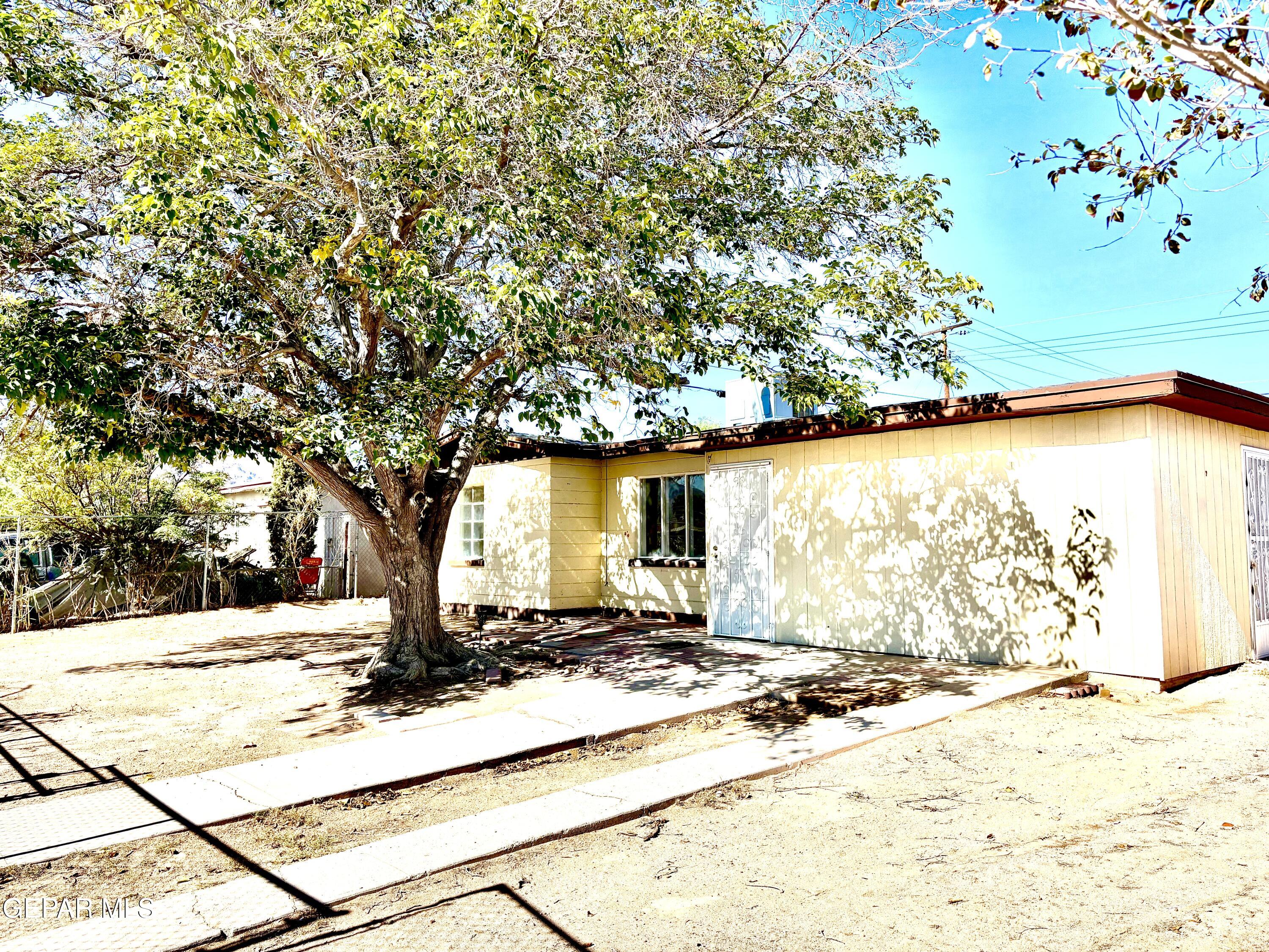 a view of a backyard of a house