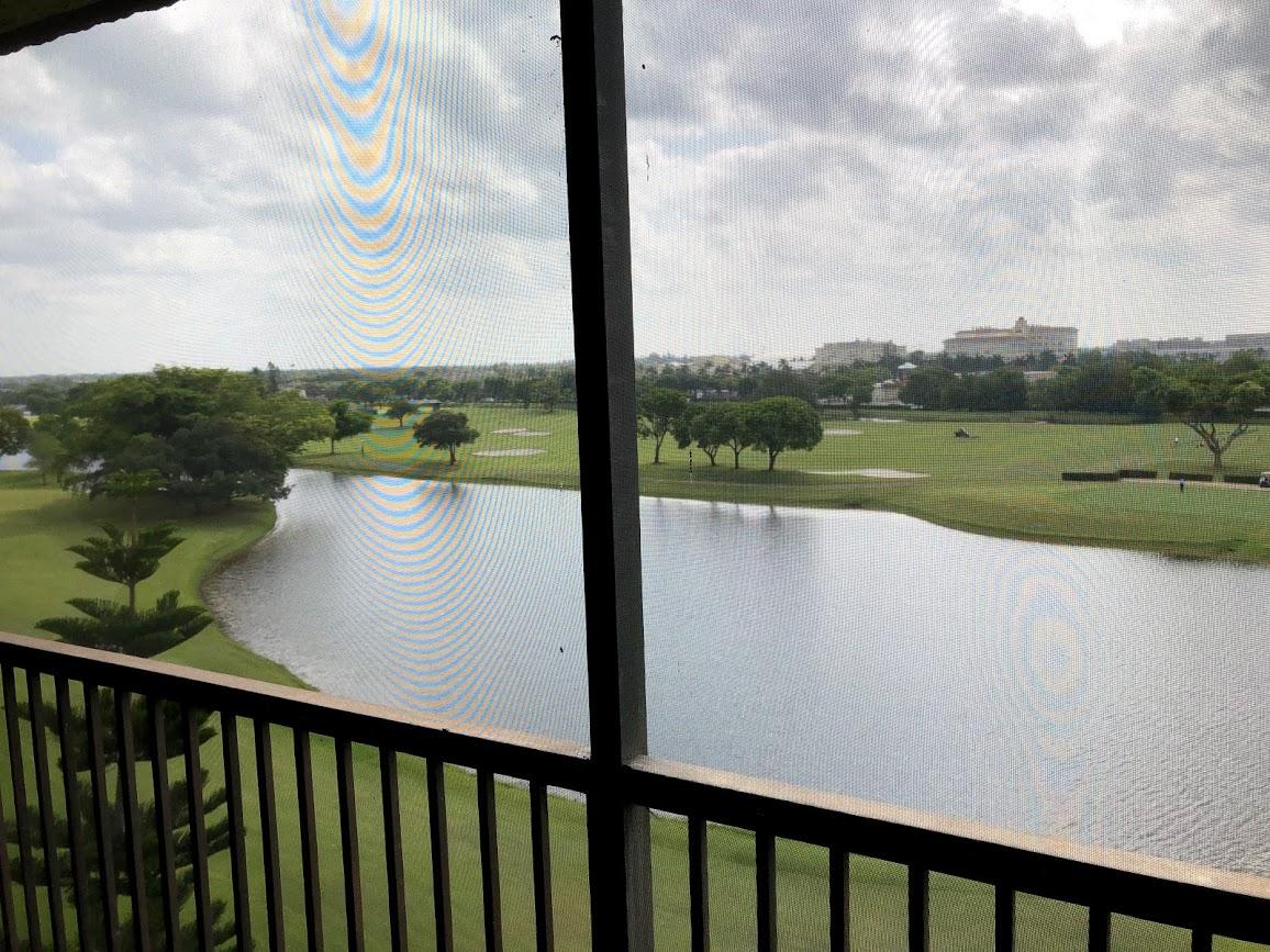 a view of a lake from a balcony