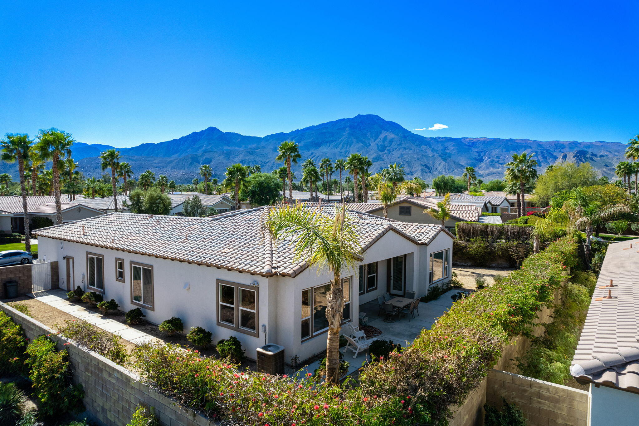 a aerial view of a house with a big yard