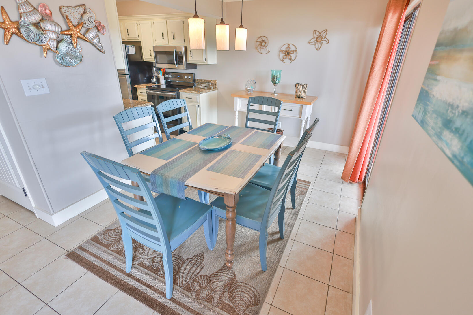 a view of a dining room with furniture