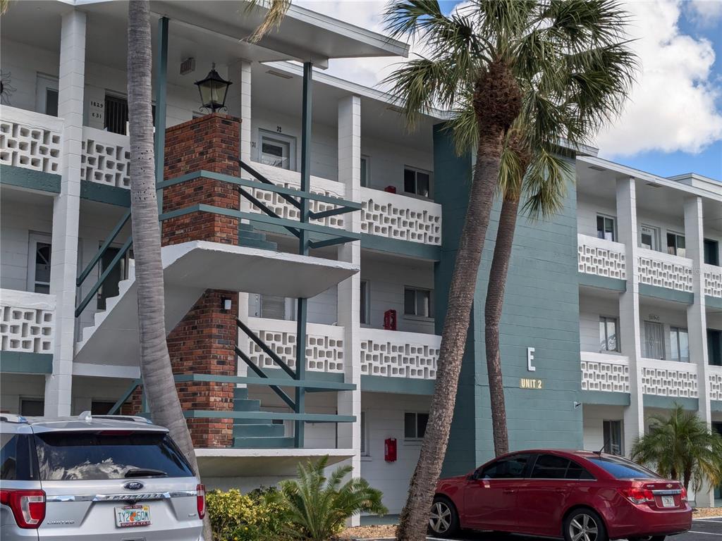 a front view of a building with balcony