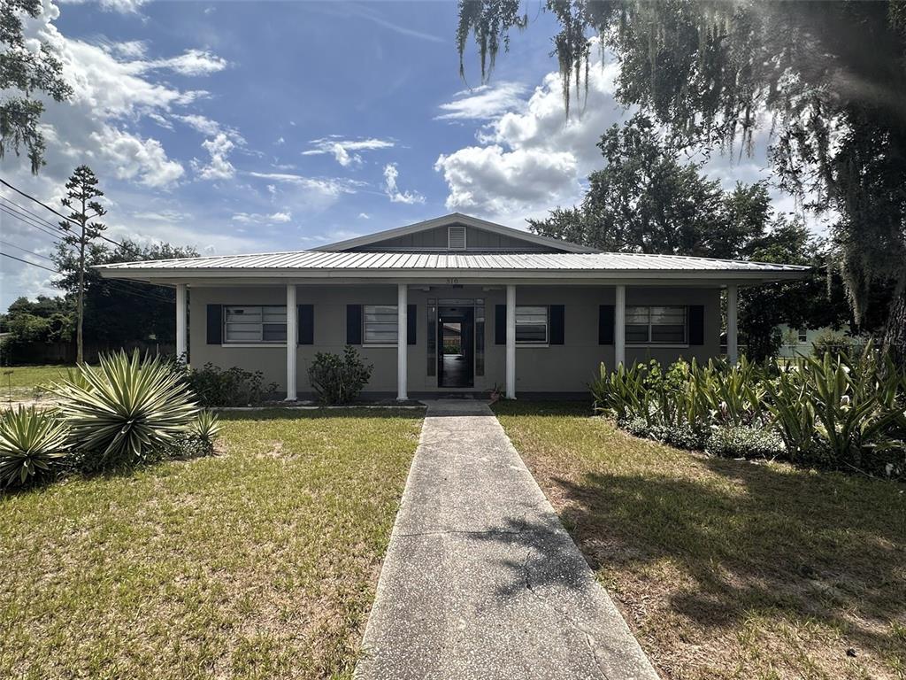 a front view of house with yard