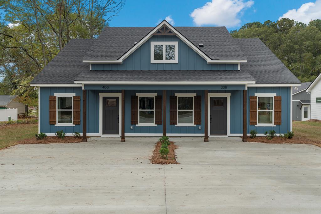 a house with a large window in front of it