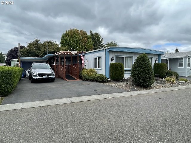 a car parked in front of a house