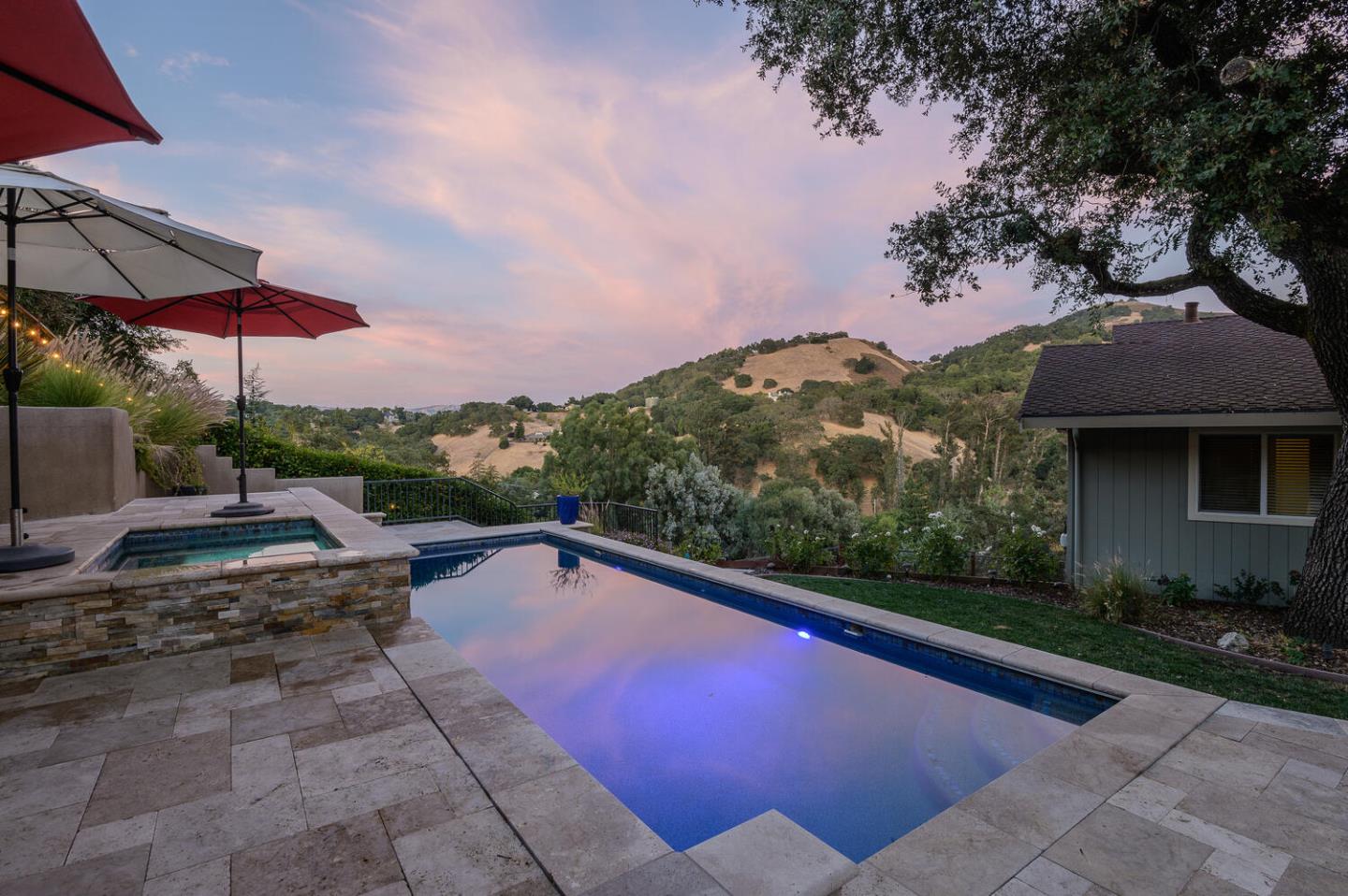 a view of a backyard with sitting area