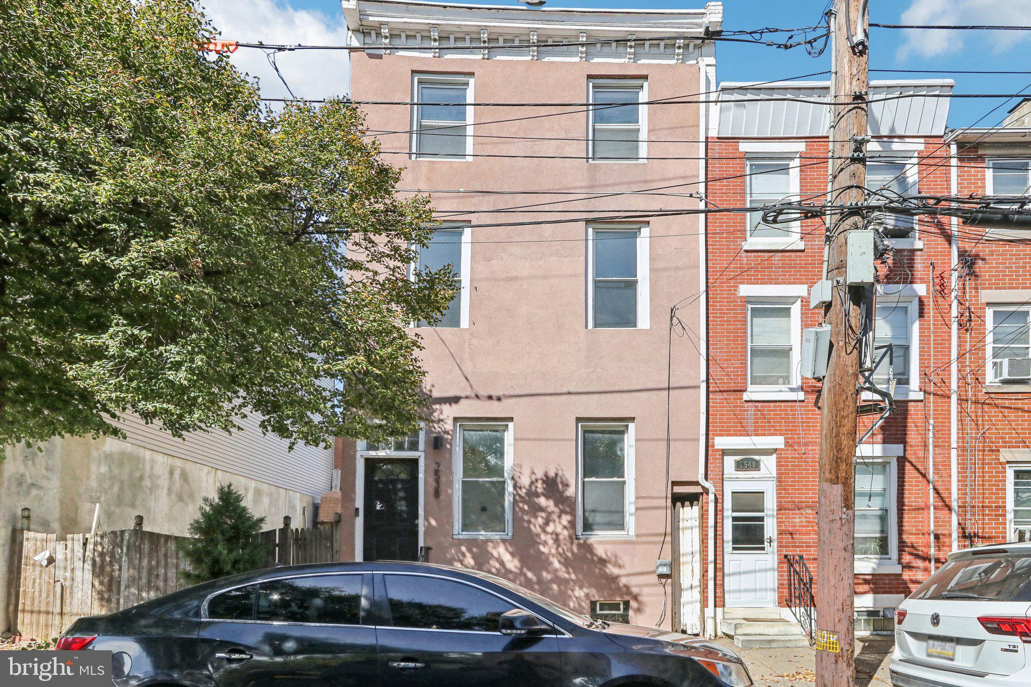 a car parked in front of a building