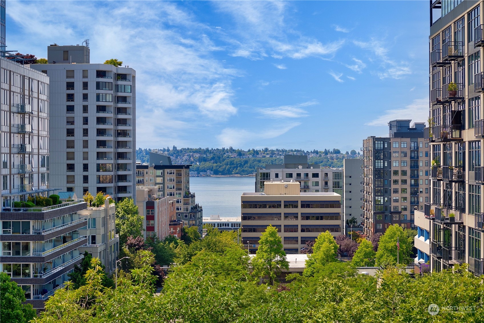 a view of a city with tall buildings