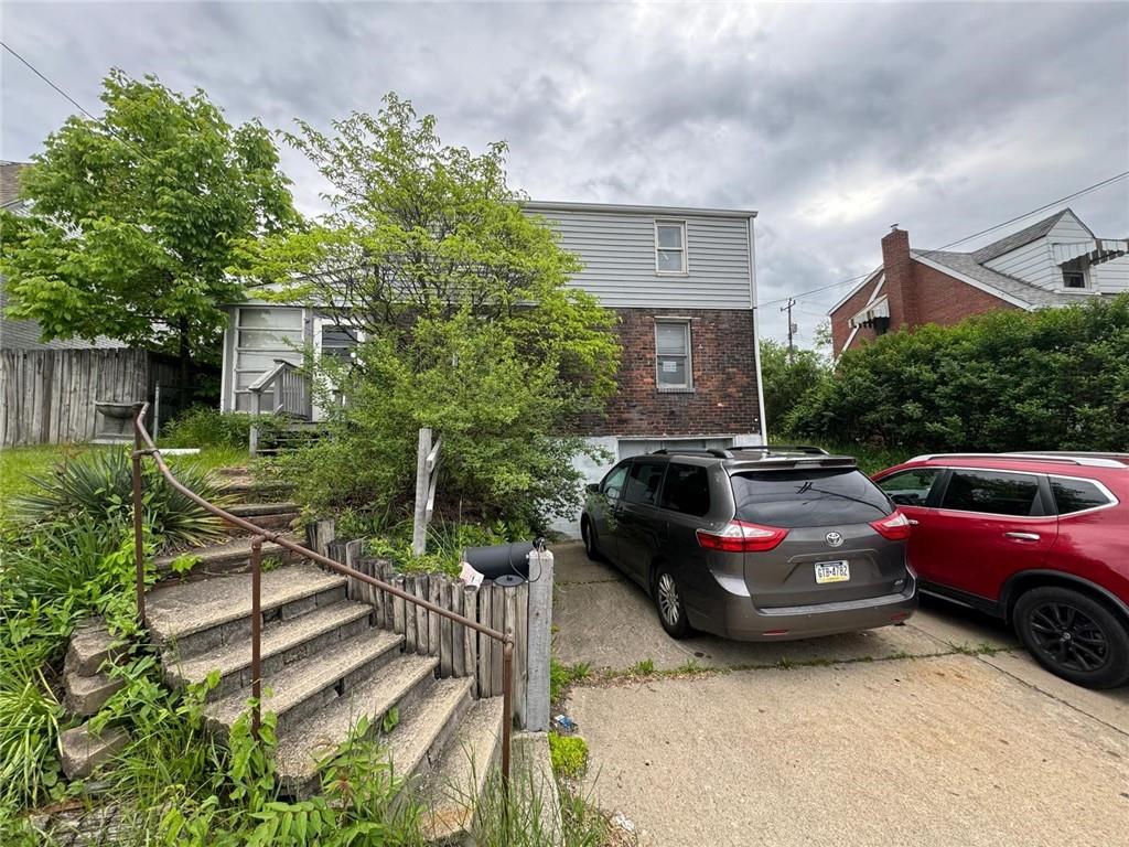 a car parked in front of a house