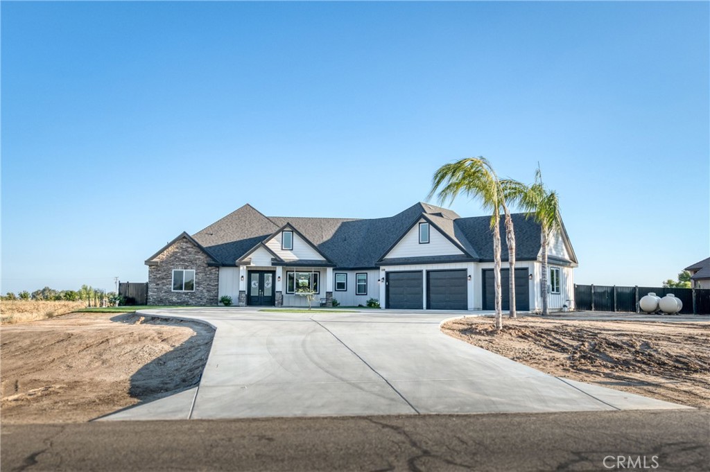 a house with trees in the background