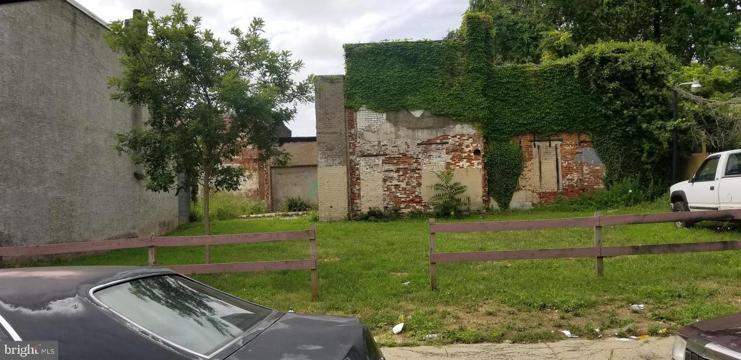 a view of a backyard with couches