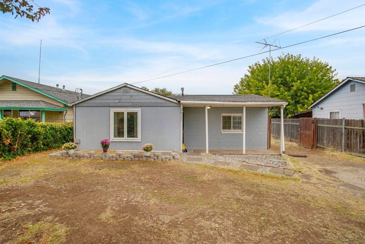 front view of a house and a yard