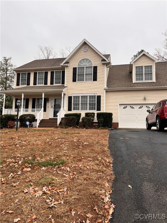 a front view of a house with parking space