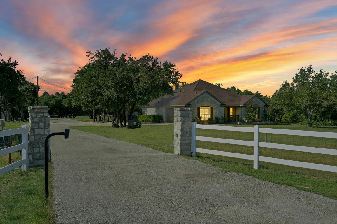 a view of house with outdoor space and street view