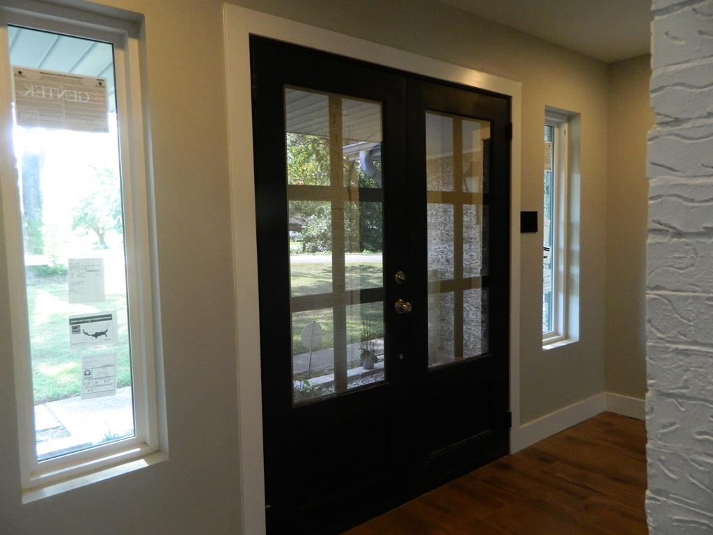 Beautiful entry with new energy efficient doors and windows