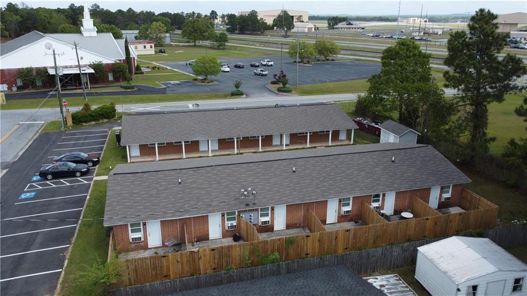 a aerial view of a house with a yard