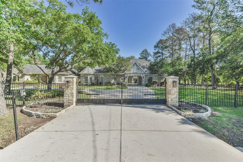 Behind these gates you will enjoy privacy and casual elegance in a one of a kind piece of property