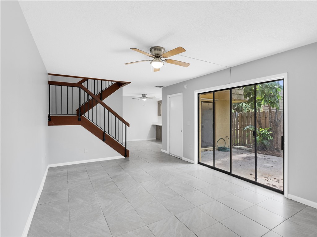 a view of a livingroom with a staircase