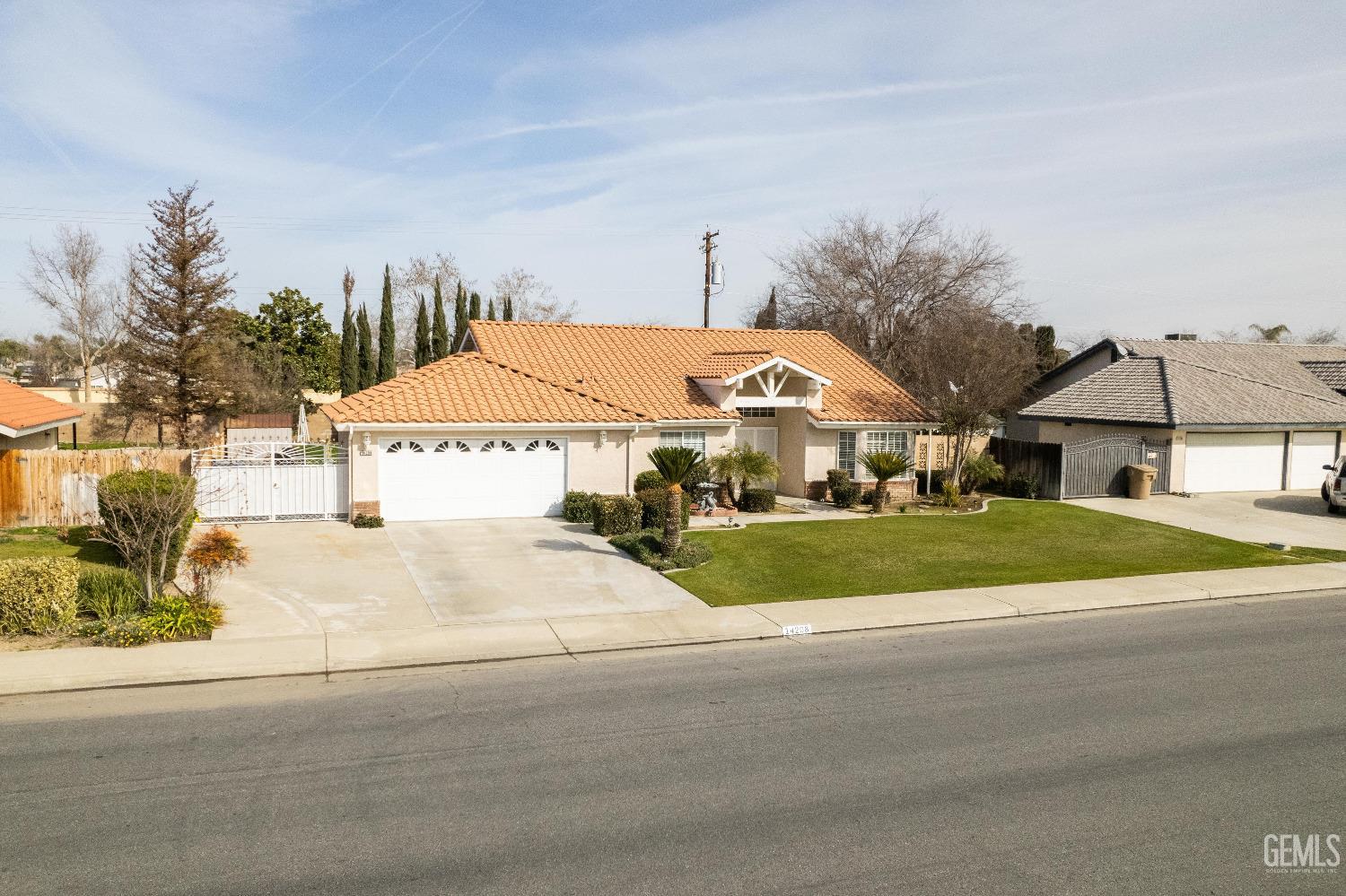 a view of house with outdoor space and street view