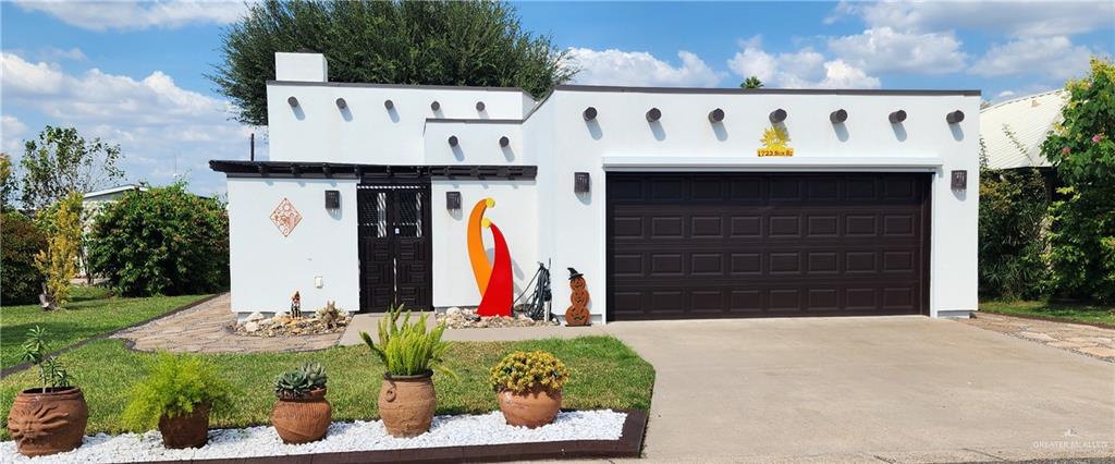 a view of outdoor space and front view of a house