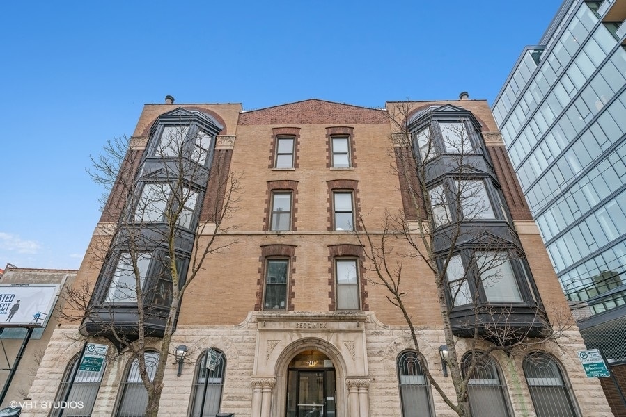 a view of a multi story residential apartment building