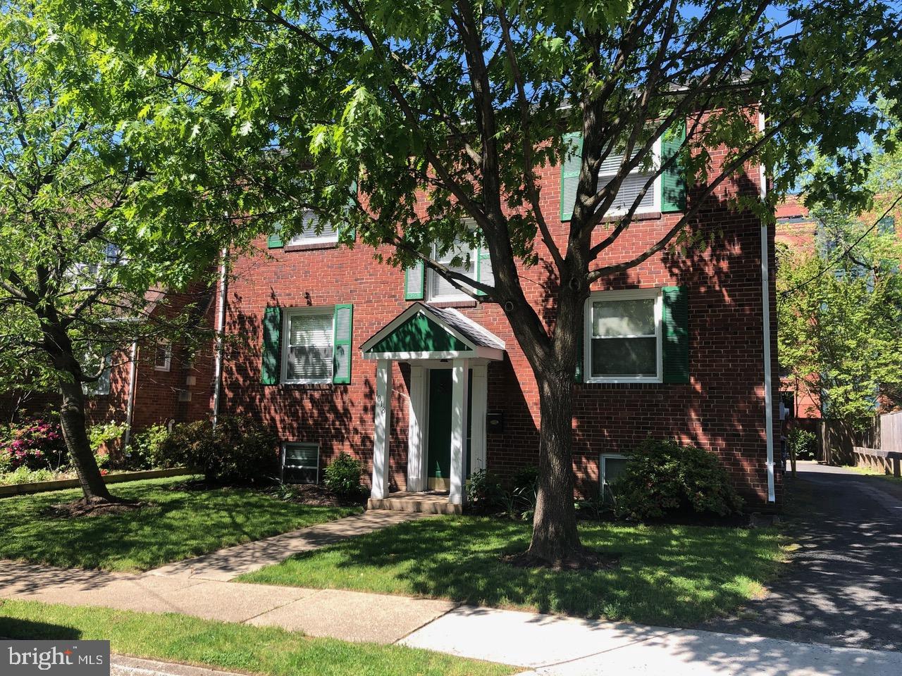 front view of house with a tree