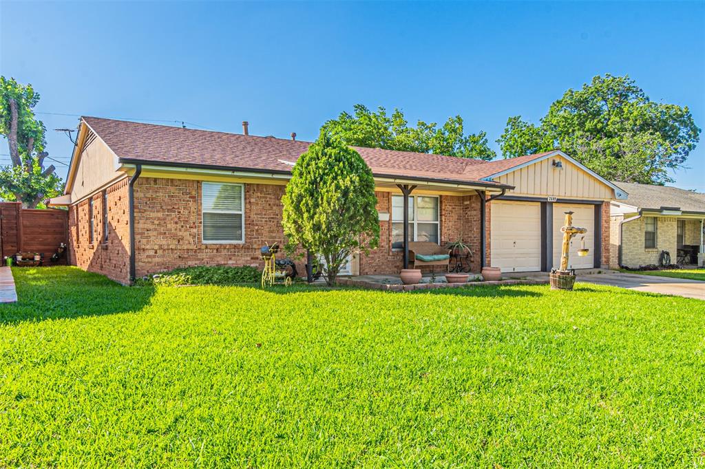 a front view of a house with patio