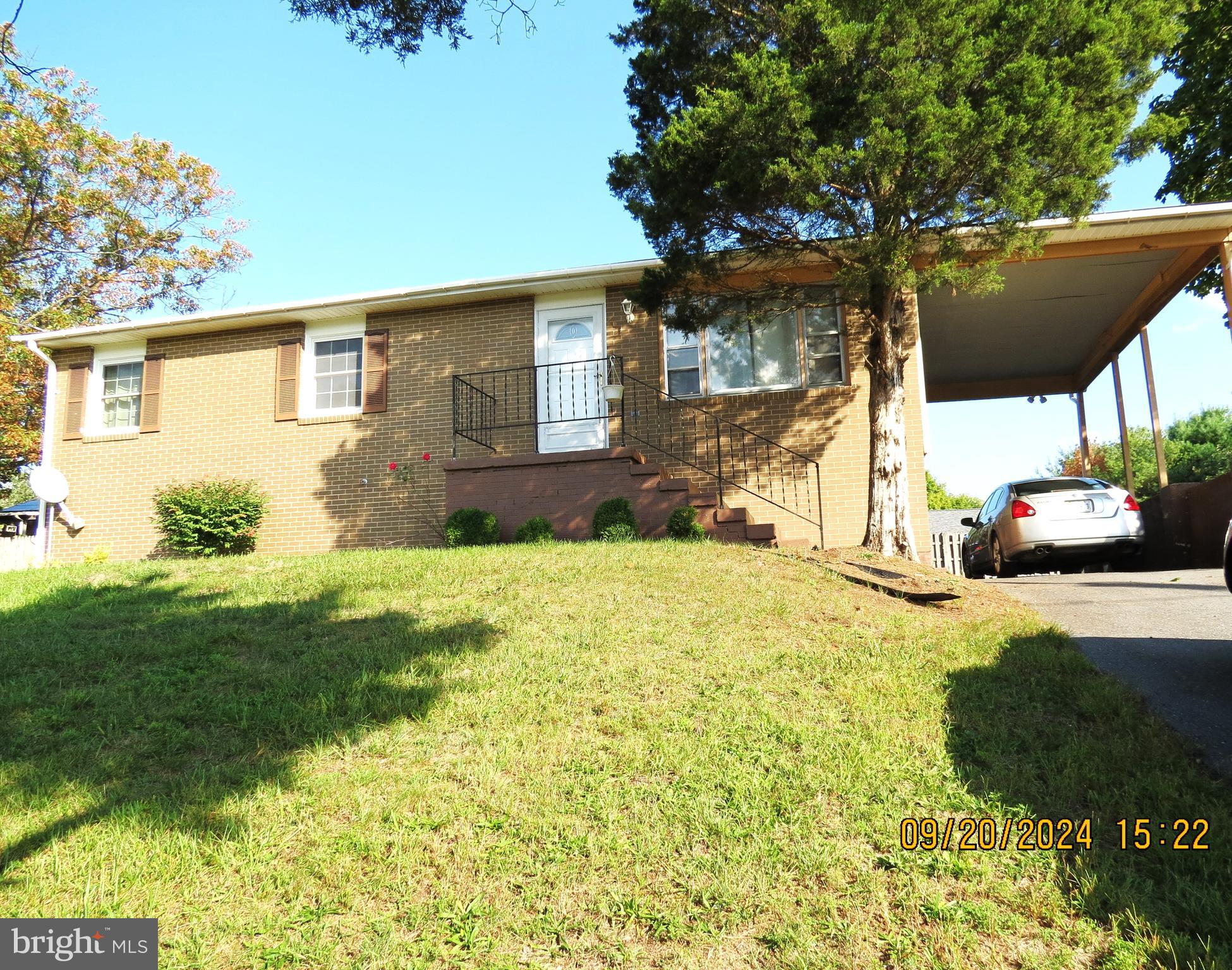 a view of a backyard of the house