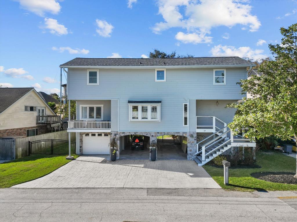 a view of house with outdoor space and sitting space