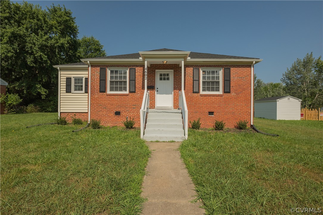 a front view of house with yard