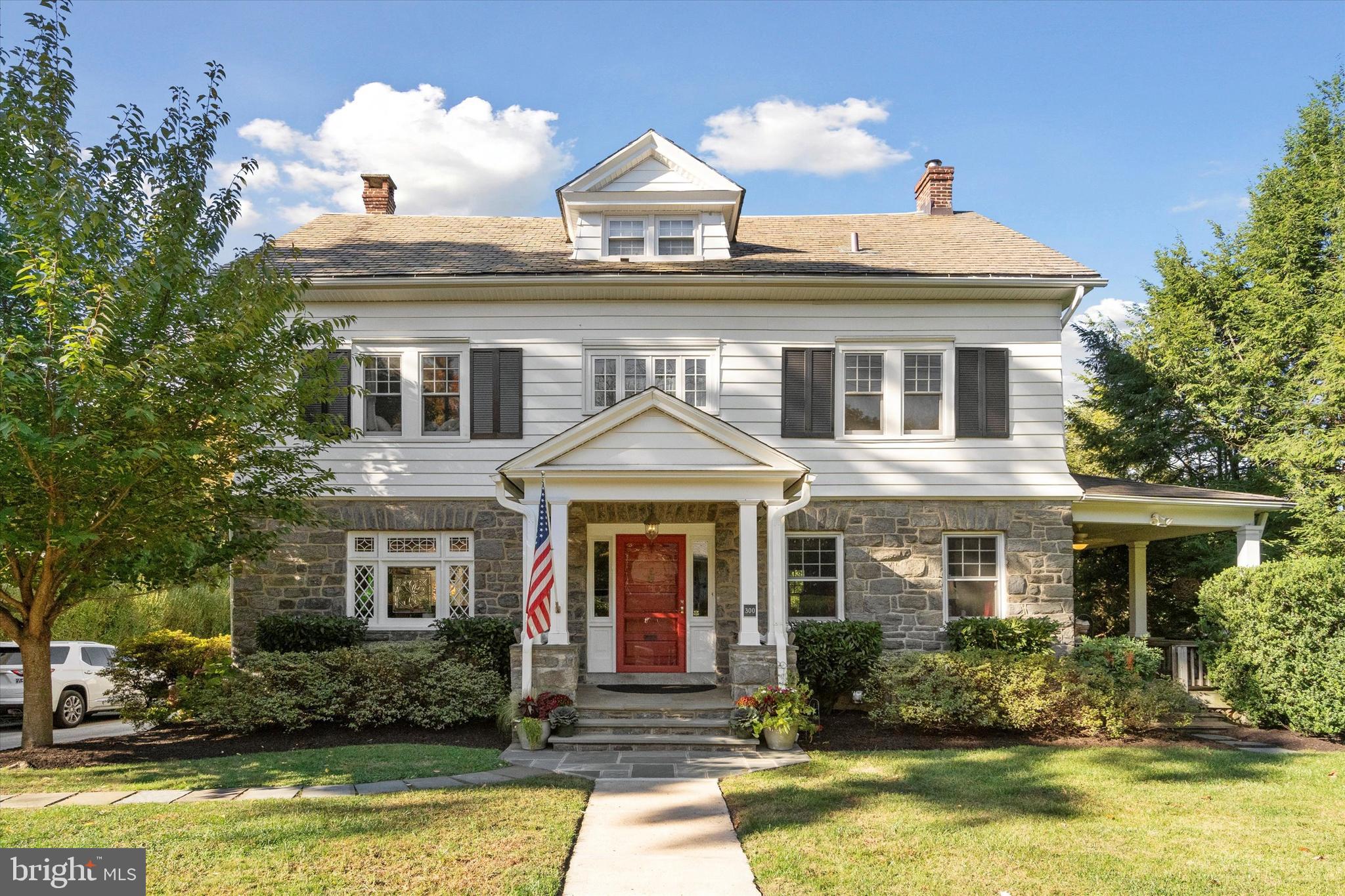 a front view of a house with swimming pool