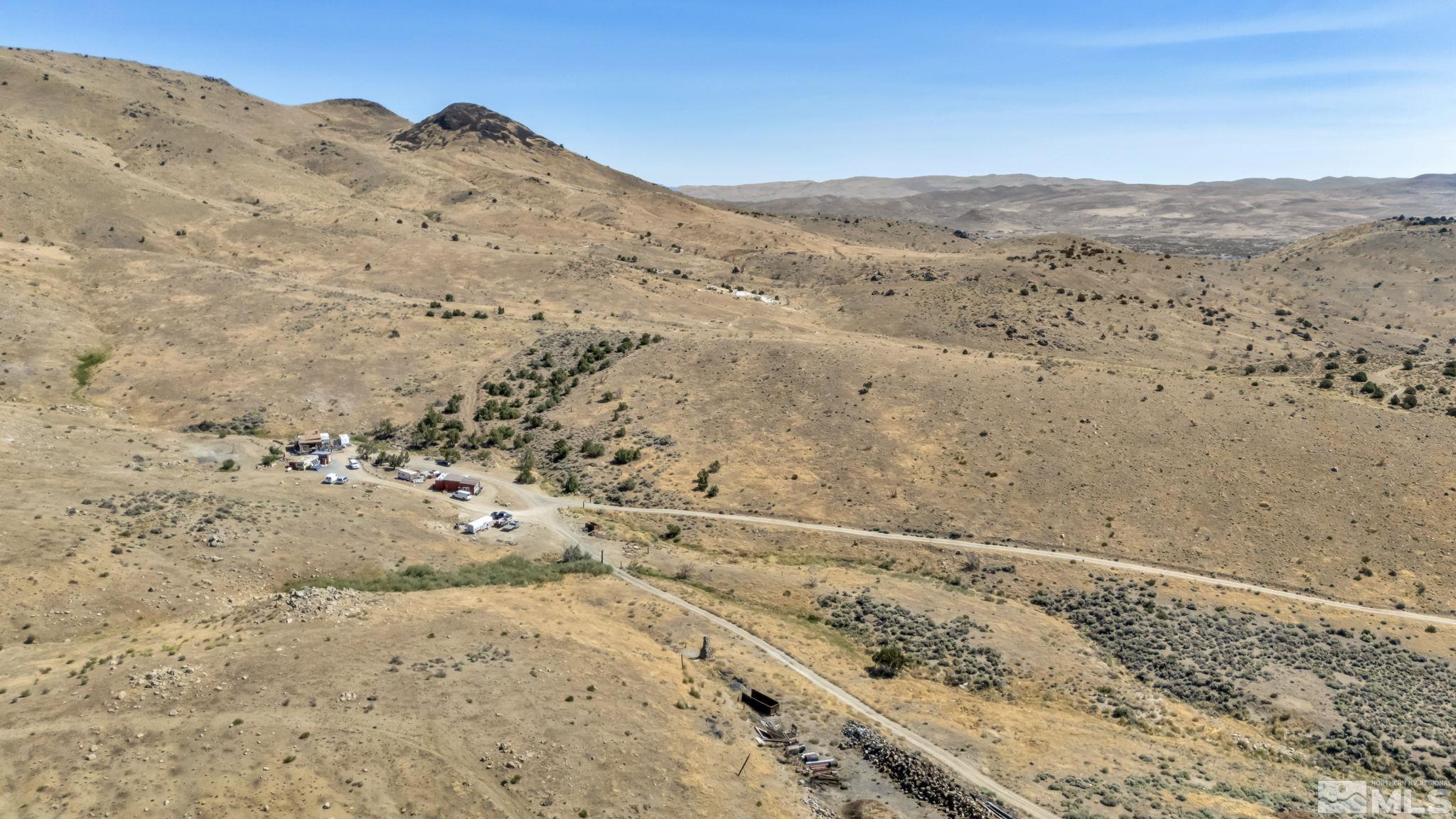 a view of mountain view with mountains in the background