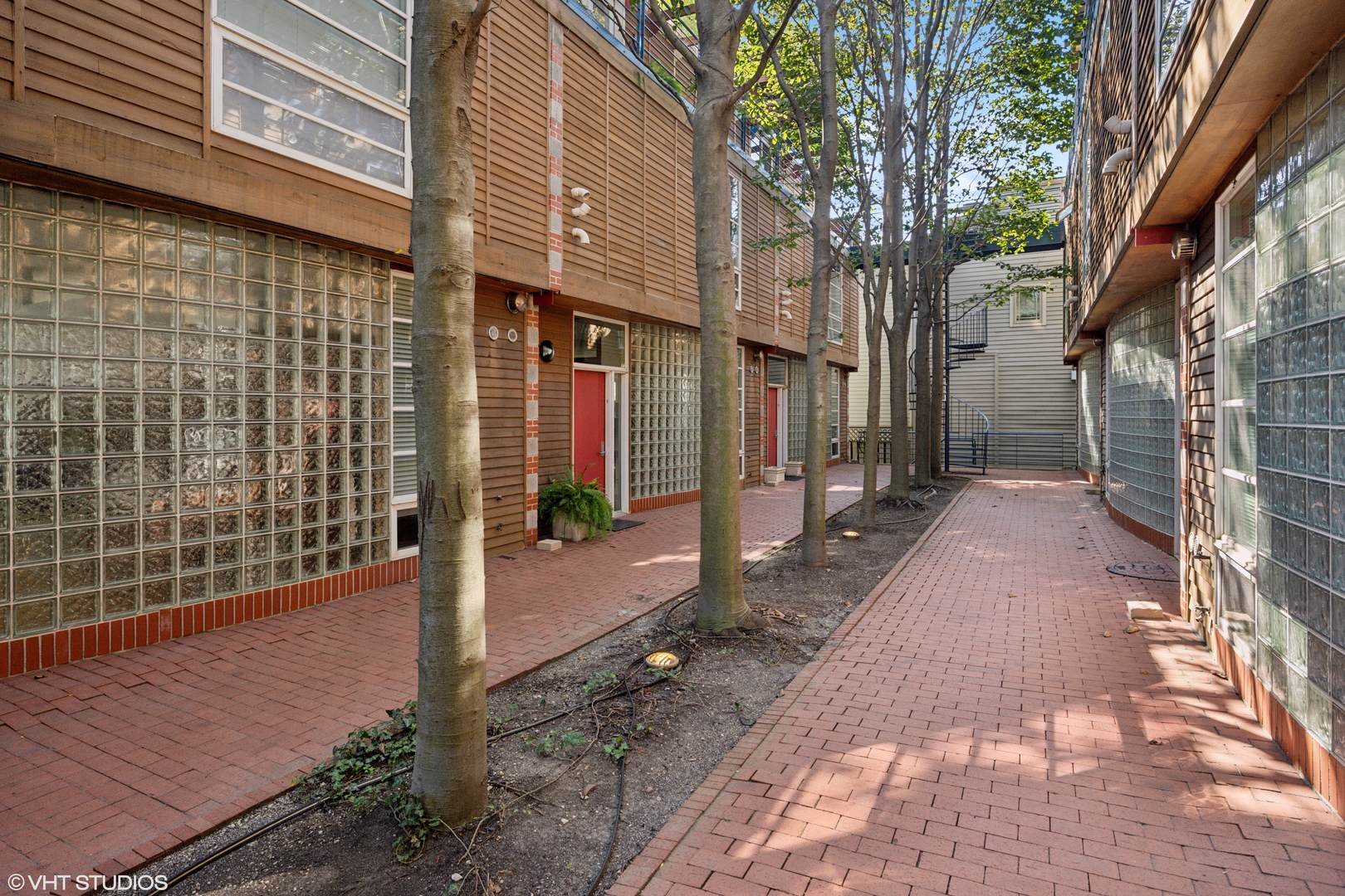 a view of a pathway both side of building