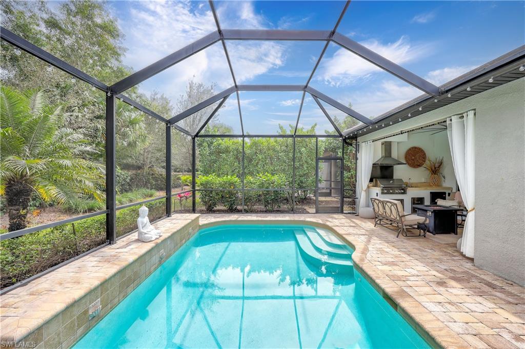 a view of swimming pool with a patio