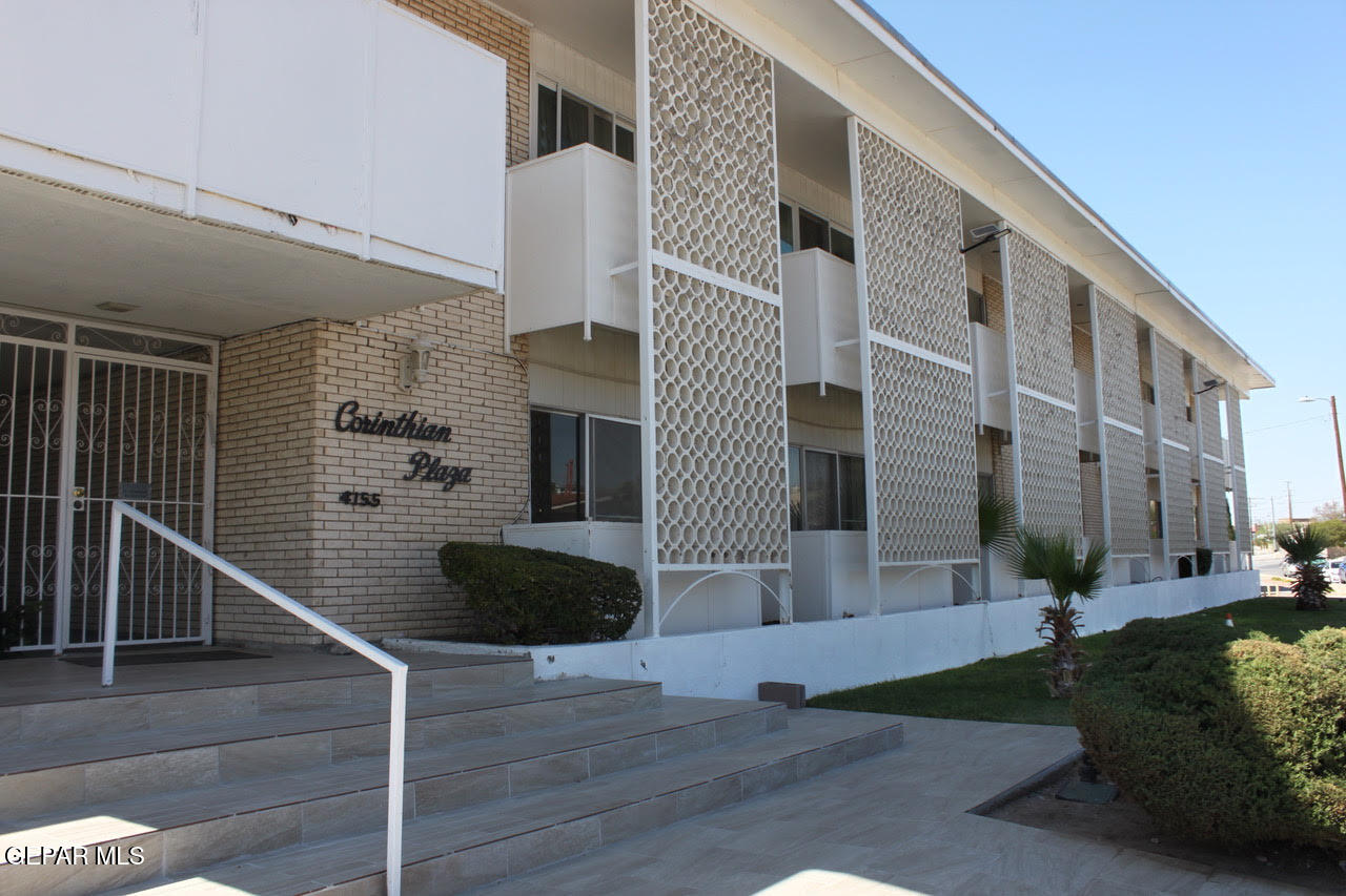 a front view of a building with street