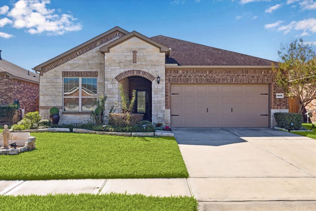 WELCOME HOME!! You've found your new home for the holidays! Lovely stone and brick elevation with a 3-car tandem garage. Wait until you see the INSIDE!