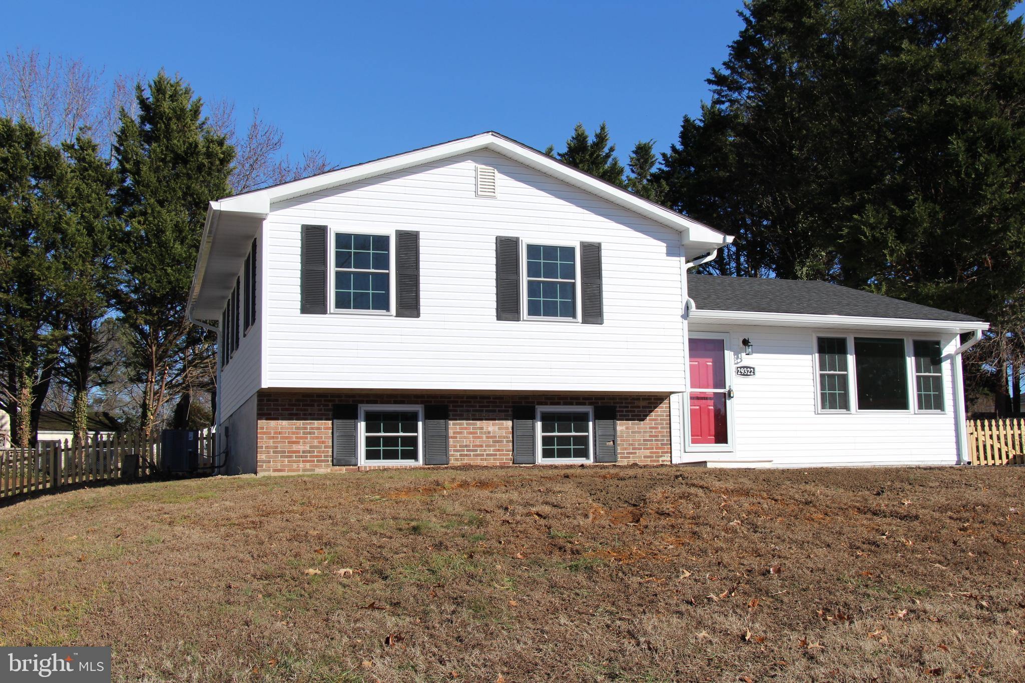 a front of house with a yard