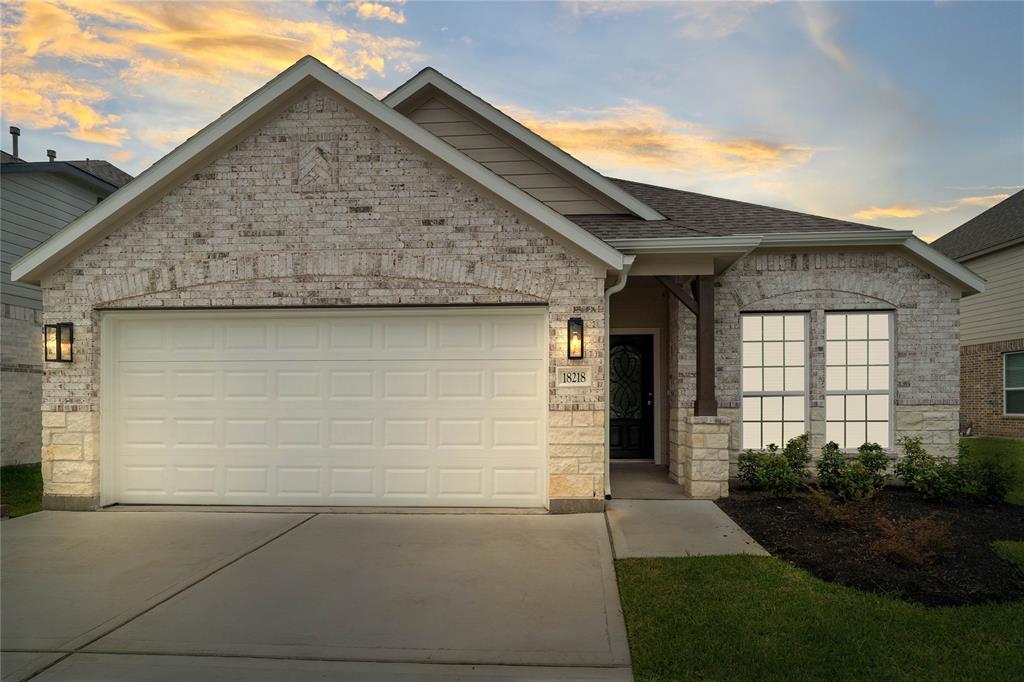 a view of a house with garage